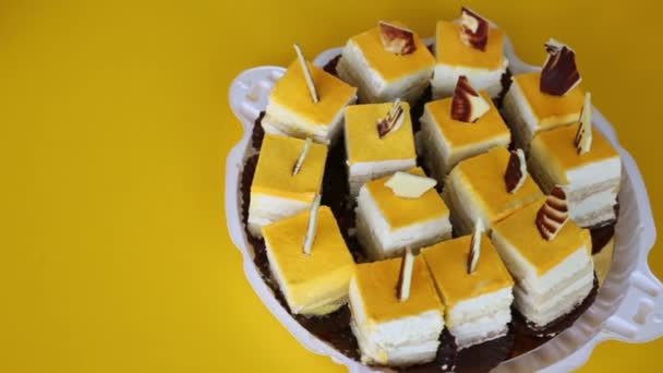 Kind of delicious sliced yellow cake — Stock Video