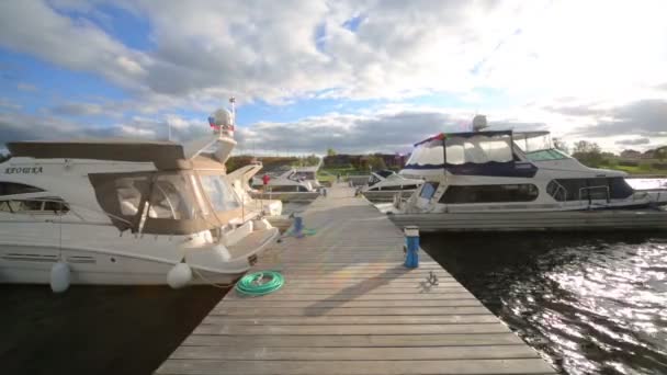 Yachts moored pier on river — Stock Video