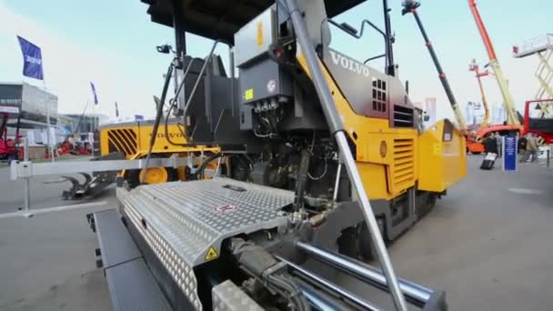 Asphalt laying machine at International Exhibition — Stock Video