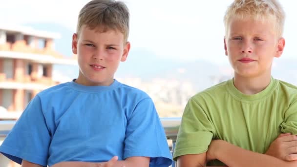 Two boys in colored T-shirts