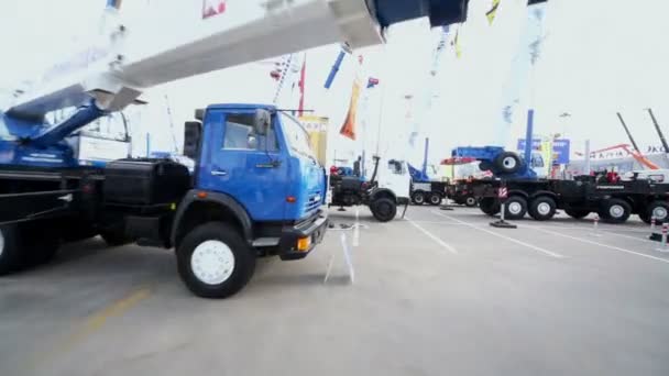 Crane trucks on International Specialized Exhibition — Stock Video