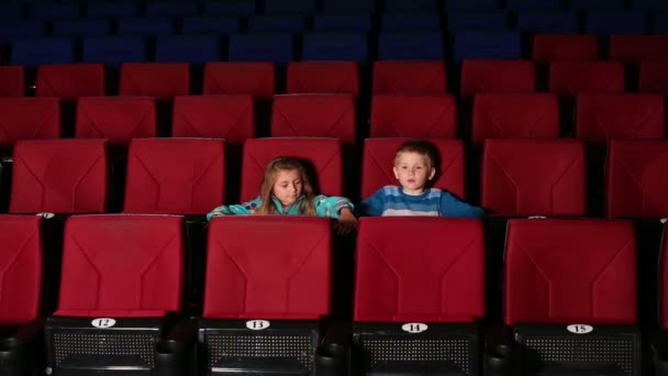 Man and woman with boy sit — Stock Video