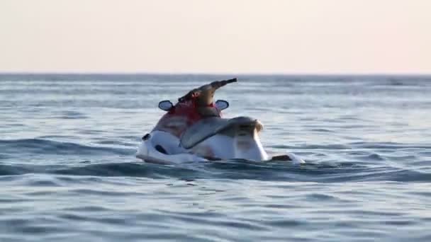 Water bike dangles on sea waves — Stock Video