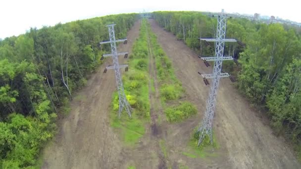 Line of power transmission towers — Stock Video