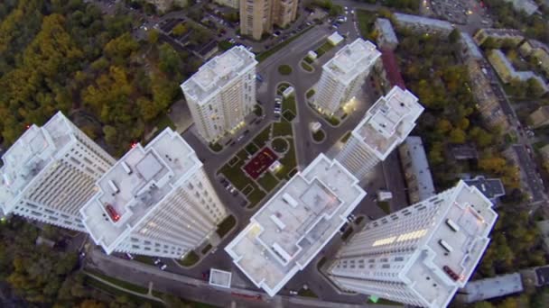 Houses of apartment complex among plants on Elk island — Stock Video