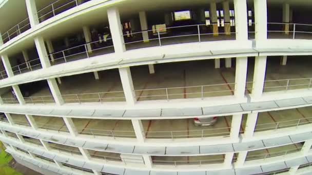 Day view: top of multistoried parking, moving camera, above view — Stock Video