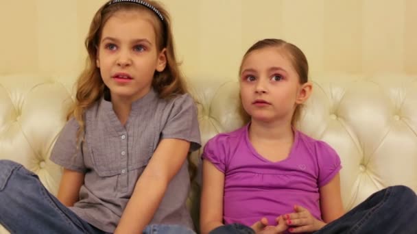 Two smiling young girls at home — Stock Video