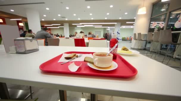 Table with cup of coffee in cafe — Stock Video