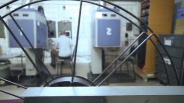Worker in room of cinema theater