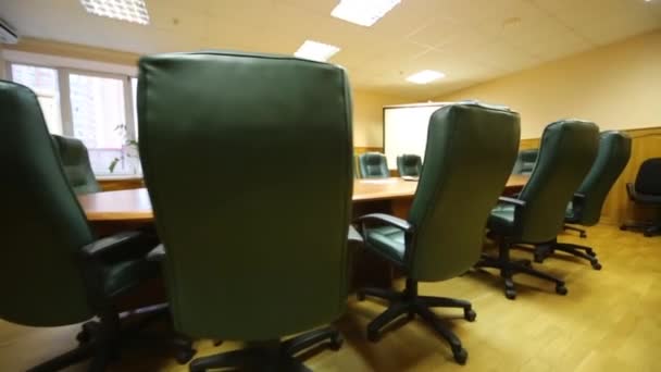 Table with armchairs in room for business meetings — Stock Video