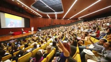 People wave their hands