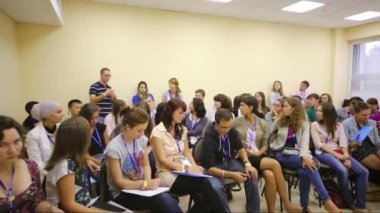young man asks speaker