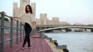 Woman makes stretching exercise