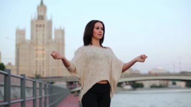 Woman makes exercise for hands