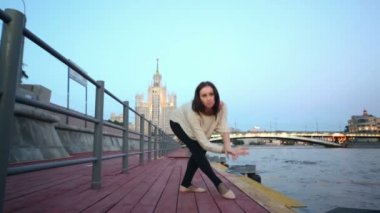 Woman makes stretching exercise