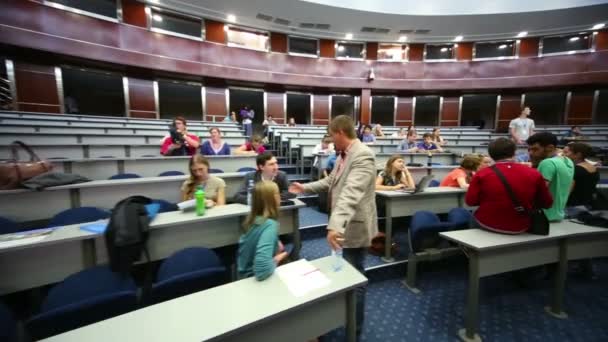 Young people in auditorium MGIMO — Stock Video