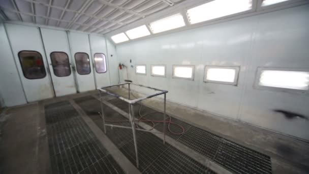 Inside empty paint-spraying booth — Stock Video