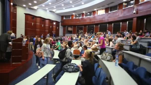 Participants of conference Voice of Youth in auditorium — Stock Video