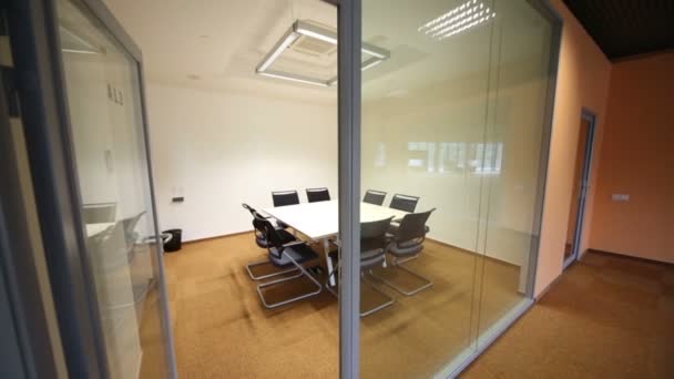 Glass entrance to empty meeting room — Stok video