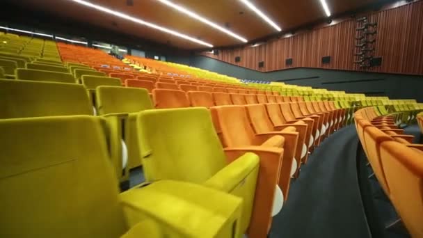 Modern empty auditorium with soft seats — Stock Video