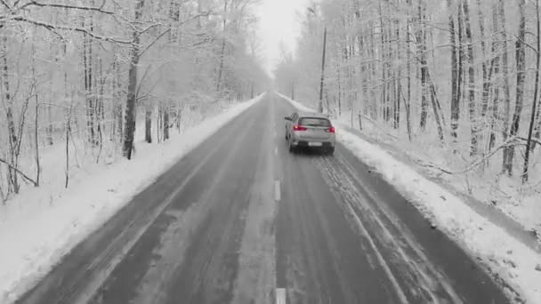 Car drive by icy road — Stok video