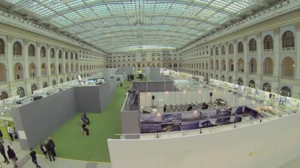 Exposition pavilions in hall of exhibition center — Stock Video