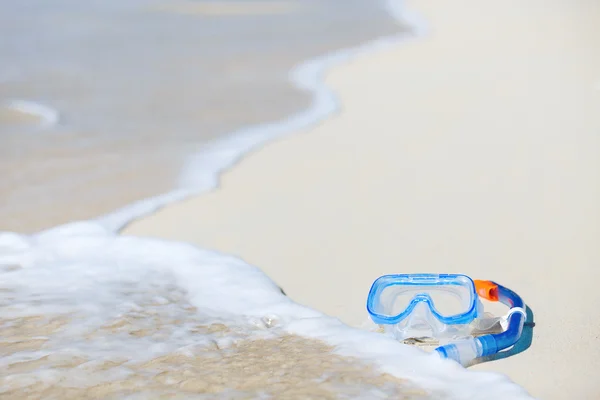 A homok, snorkeling felszerelés — Stock Fotó