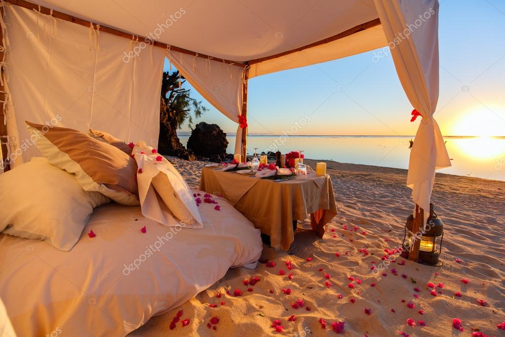 Romantic dinner at beach — Stock Photo © shalamov #107473850