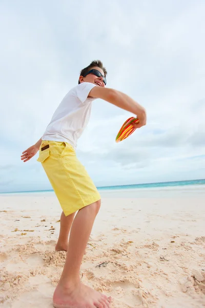 Little boy playing with flying disk — Stock Photo, Image