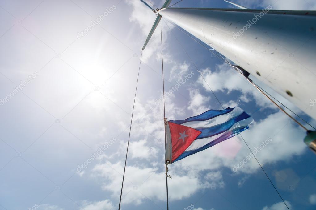 Cuban flag over the sky