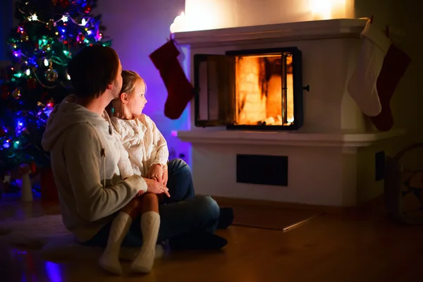 Family at home on Christmas eve — Stock Photo, Image