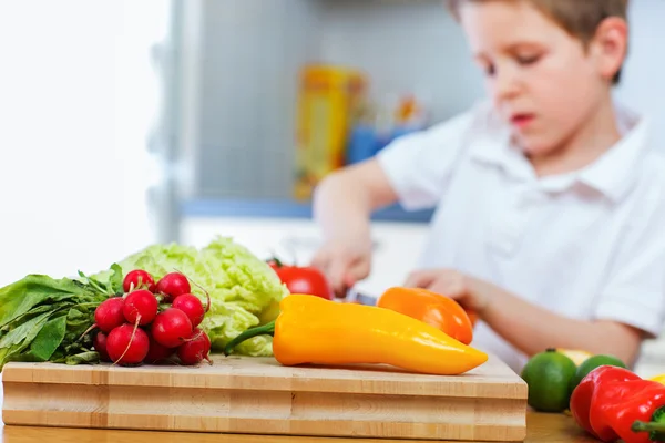 Little boy helping at kitchen — Stock Photo, Image