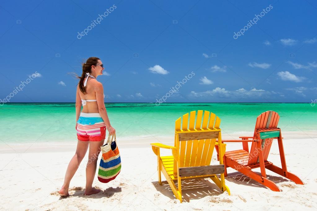 Young woman on beach vacation