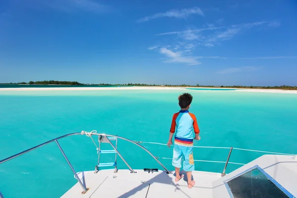 Little boy at luxury yacht — Stock Photo, Image