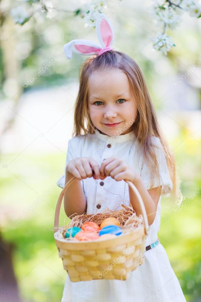 Little girl with Easter eggs