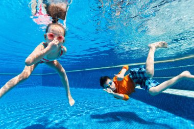 Kids  swimming underwater clipart