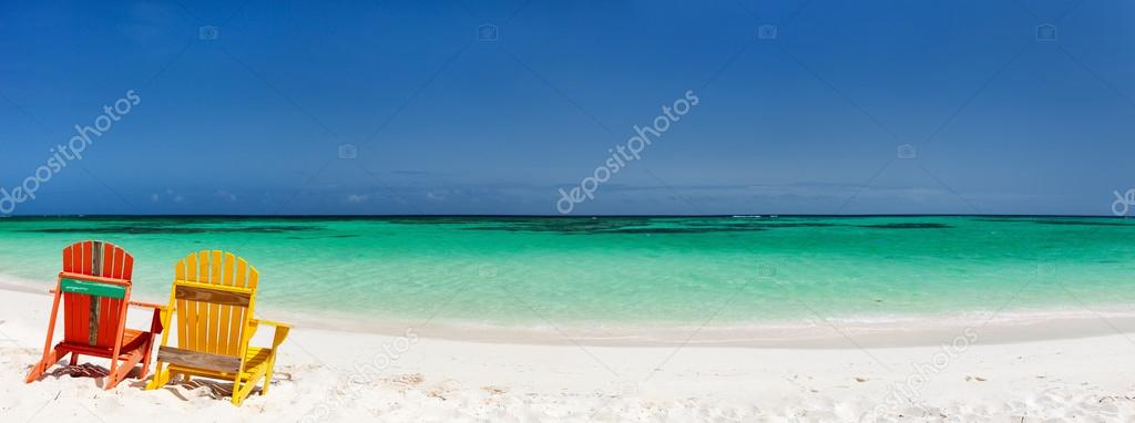 Colorful lounge chairs at Caribbean beach