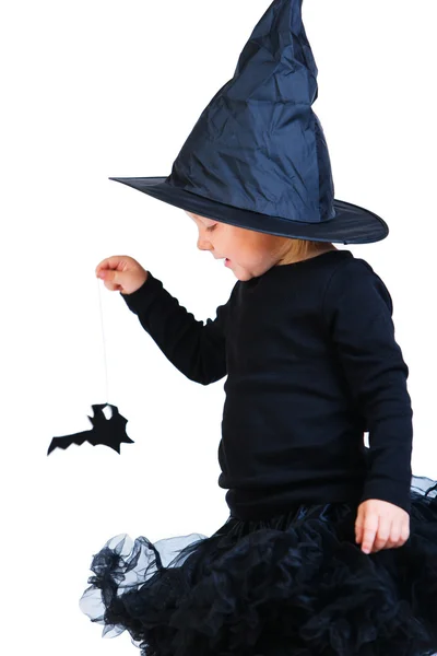 Menina de criança em preto pequeno traje de bruxa — Fotografia de Stock