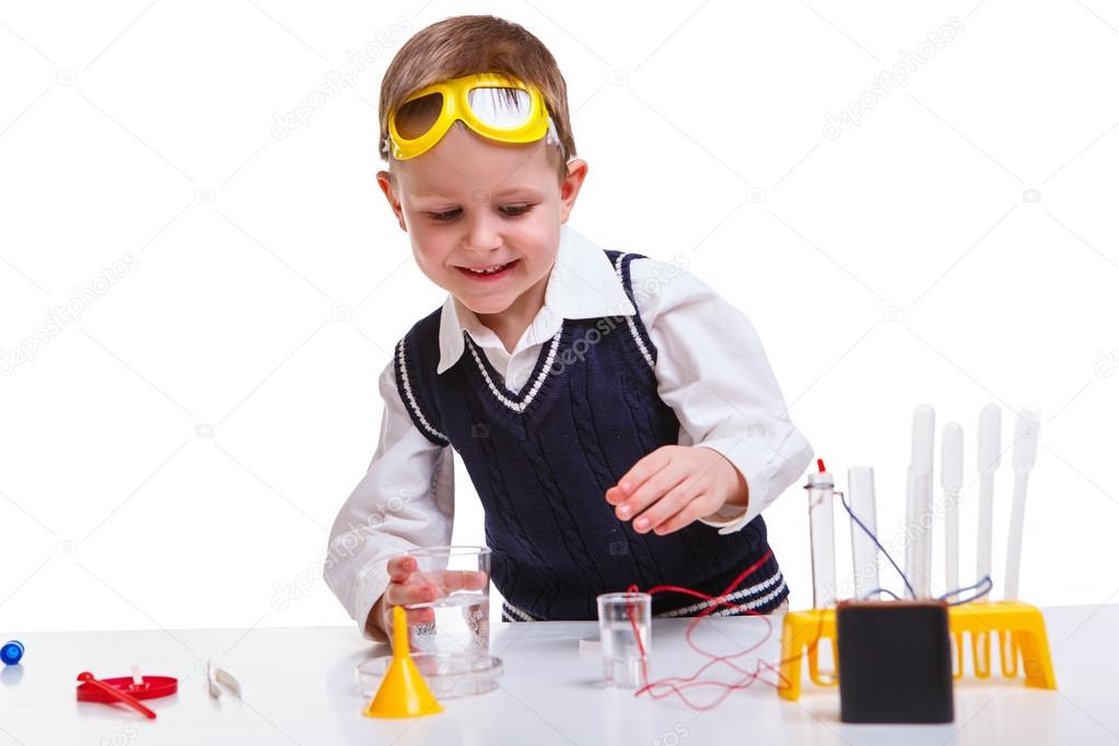 Young boy making experiment