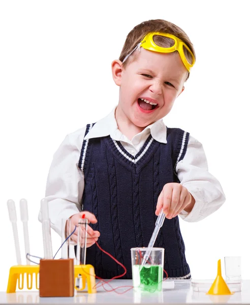 Boy performing chemistry experiment — Stock Photo, Image