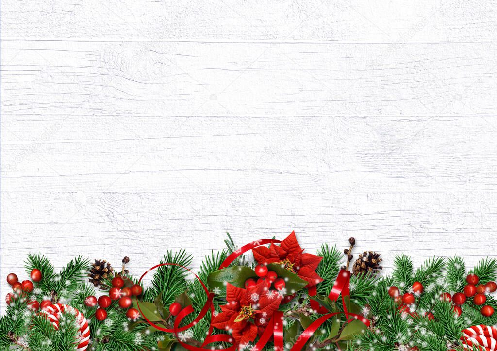 Christmas Holiday Background with beautiful decorations  firtree, poinsettia, holly and sweet candy. Holiday postcard with copy space.