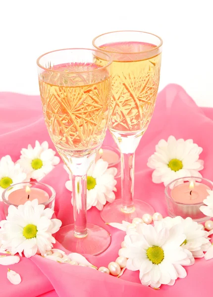 Champagne glasses and flowers — Stock Photo, Image