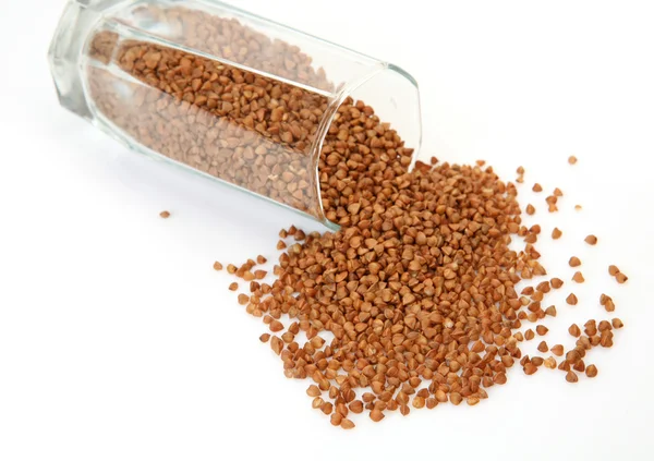 Buckwheat groats on a white background — Stock Photo, Image