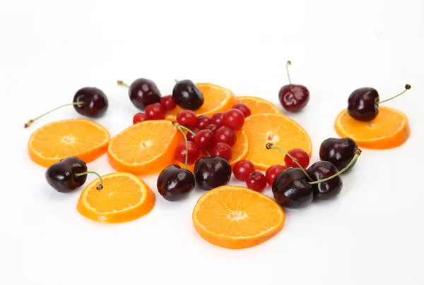 Sliced Oranges Cherries White Background — Stock Photo, Image