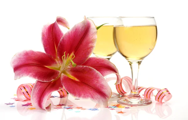 Wine and pink lilies — Stock Photo, Image