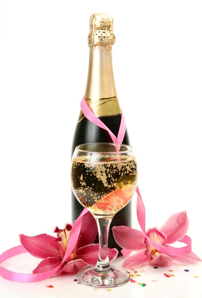 Champagne and pink orchids — Stock Photo, Image