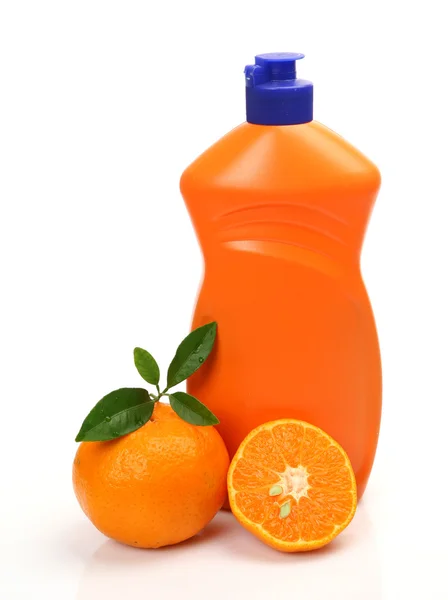 Dishwashing detergent with oranges — Stock Photo, Image