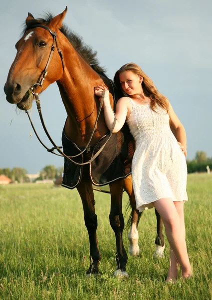 Dívka a kůň Stock Fotografie