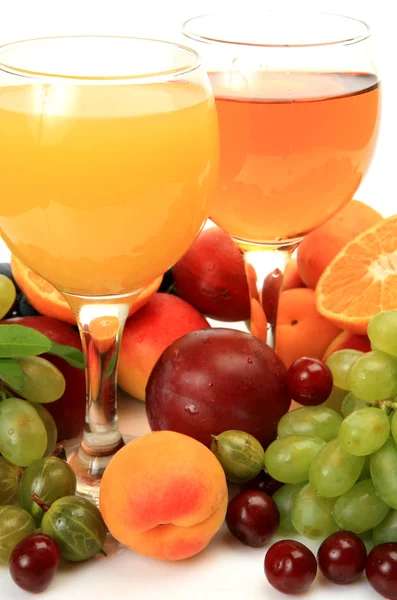 Ripe fruits and juice — Stock Photo, Image