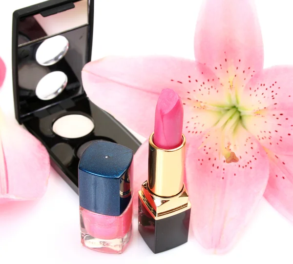 Pink lily and cosmetics — Stock Photo, Image